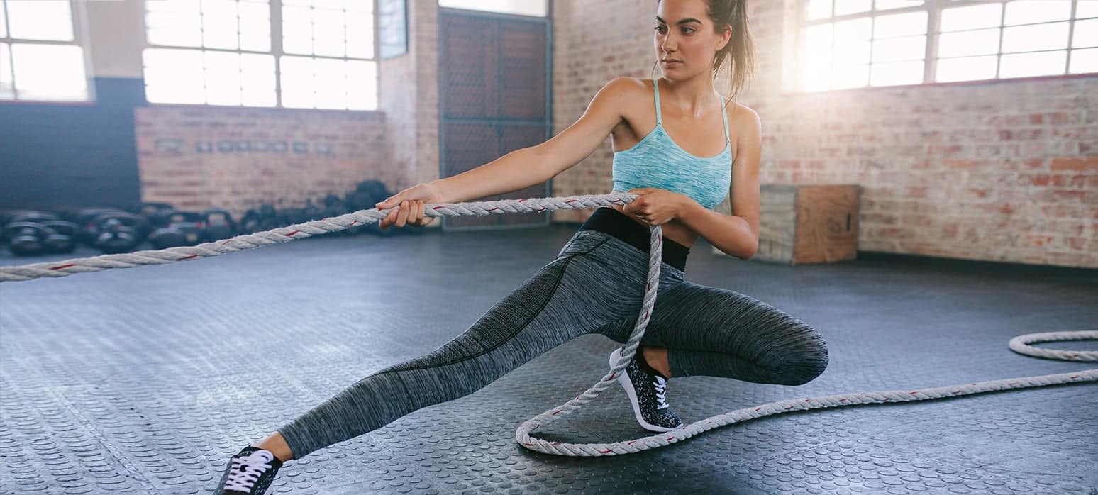woman pulling rope fixing knee pain